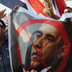 Egyptian protesters carry anti-Obama posters in Tahrir Square in Cairo. (Spencer Platt/Getty Images)